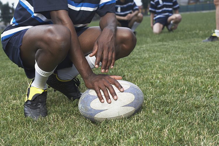 Rugby player crouching